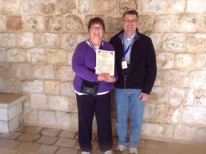 Julie & Steve Colden with certificate of Wedding Covenant Renewal - Cana of Galilee